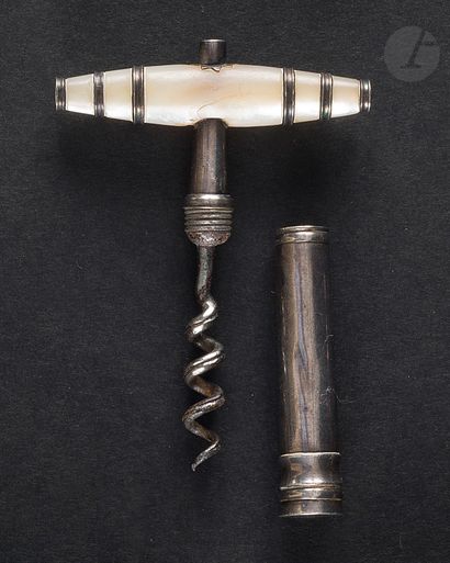 Silver corkscrew. With a worm guard and a...