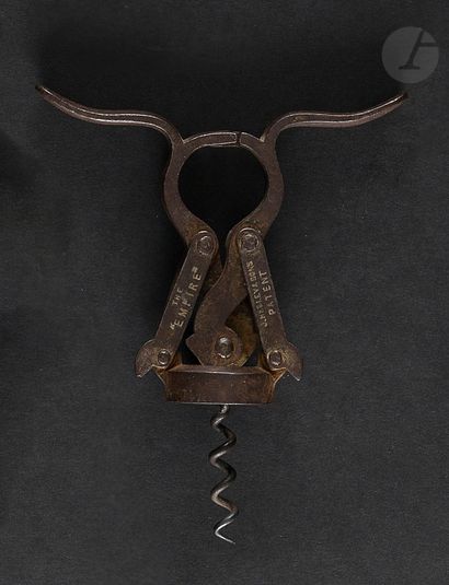 null JOHN HEELEY

Extensible corkscrew in iron with two handles.

Marked " THE EMPIRE...