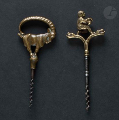 null Two simple corkscrews, the handles in bronze representing an ibex and a monkey.

Heights:...