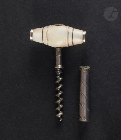 null Silver pocket corkscrew. A mother-of-pearl handle in the shape of a barrel,...