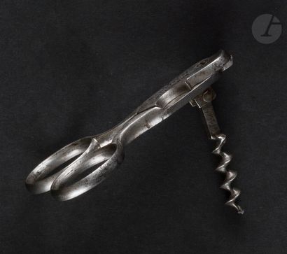 null Folding corkscrew forming cut wuselet in nickel-plated metal.

Marked " DUMINY...