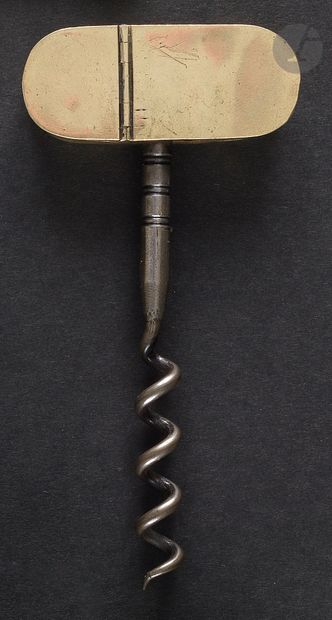 Simple corkscrew, the handle forming a brass...