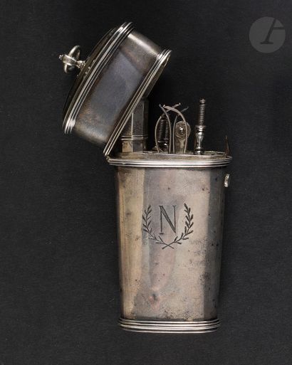null 
Silver tool kit. With a silver case engraved with the "N" of Napoleon, containing...