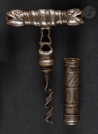 Iron pocket corkscrew, the handle decorated...