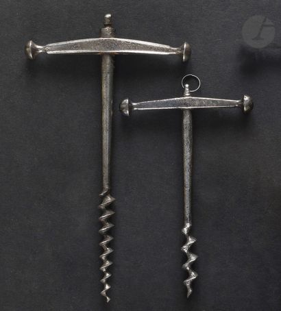 Two simple corkscrews in wrought iron, the...