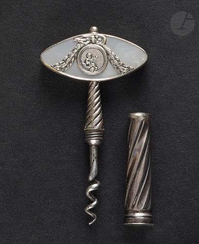 Silver corkscrew. With a shaft imitating...