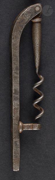 Folding corkscrew in wrought iron, the catch...