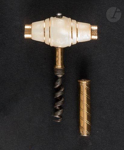 
Gold corkscrew (18 kt). The wick guard has...