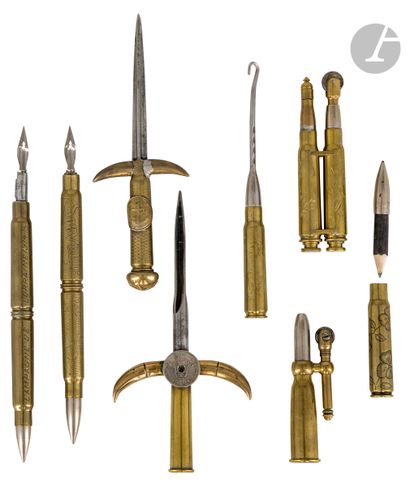 null Set of:
Eight trench souvenirs including: daggers, pen holders, lighters, one...
