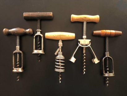 null Five corkscrews with cage and spring out of metal, some with cage deployant...