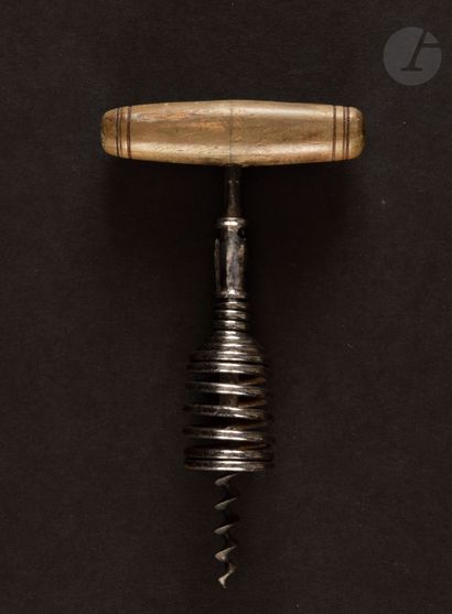  Corkscrew with iron spring cage with blocking system, the handle in turned wood....