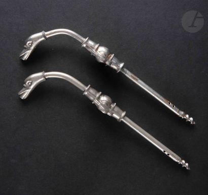 null PERIL and attributed to

Two nickel-plated metal champagne siphons.

One marked...