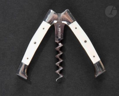  LOUIS VUITTON 
Folding corkscrew of pocket with two arms out of metal and plate...