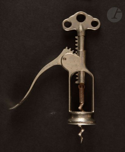  Lever corkscrew in nickel-plated metal said "THE PERFECT", the handle with three...