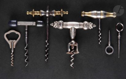 null Five simple corkscrews, one with short bell, and two picks, the handles in silvered...