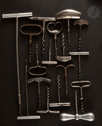 null Seventeen simple corkscrews in iron, the handles of various forms in iron or...