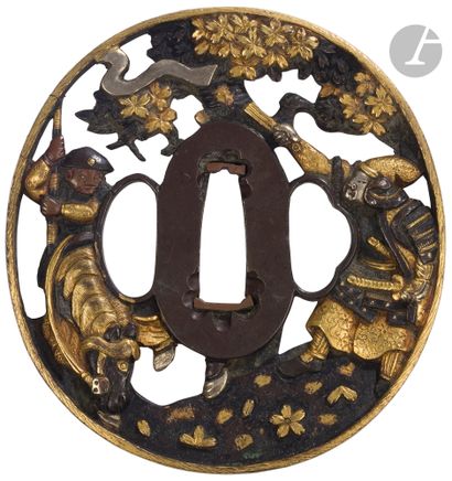 null Tsuba en yamagane, Japon, milieu de l’époque Edo
De forme nagamarugata décorée...