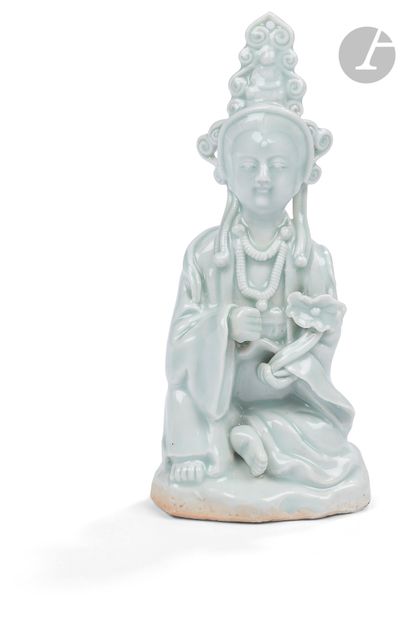null Small bluish-white qingbai porcelain Guanyin, China, 18th centuryRepresented
seated,...