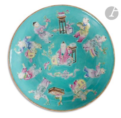 null Enameled porcelain dish in the famille rose style on a turquoise background...