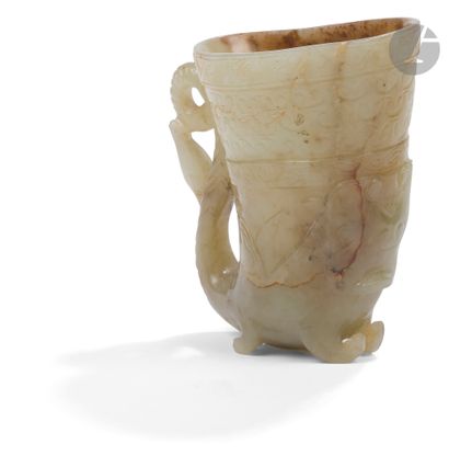 null Rhyton in celadon nephrite with red inclusions, China, 19th - 20th centuryThe
vase,...