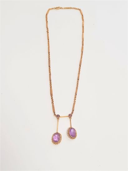 null Necklace neglected in gold 18K (750) articulated elongated links holding 2 amethysts...