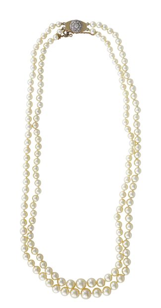 null Necklace of two rows of cultured pearls, clasp in 18K (750) gold and platinum...