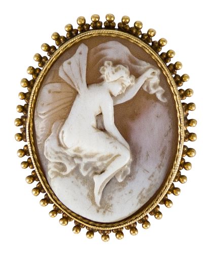 null Shell cameo brooch representing a winged woman with drapery, the setting in...
