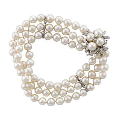 null Bracelet de 3 rangs de perles de culture, scandé de barettes en or 9K (375)...
