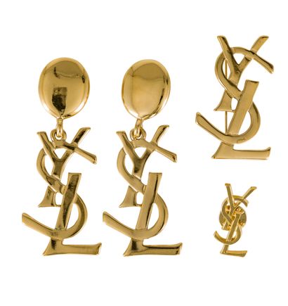 Yves SAINT LAURENT. Set with the logo of...