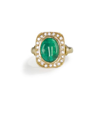 null Ring in 18K (750) gold, set with a cabochon emerald surrounded by round brilliant-cut...
