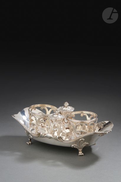 null PARIS 1759 - 1760
Silver oil and vinegar cruet and its stoppers resting on four...