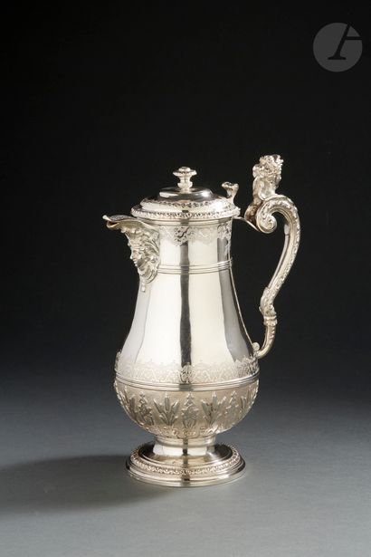 null PARIS 1728 - 1729 
Rare silver ewer standing on a pedestal molded with oves...