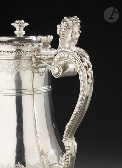 null PARIS 1728 - 1729 
Rare silver ewer standing on a pedestal molded with oves...