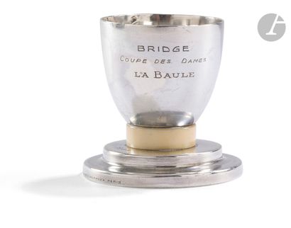 null PARIS CIRCA 1933
Silver egg cup resting on a base with double tray. The whole...