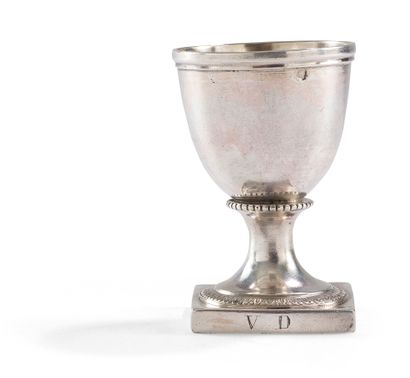 null FRANCE AFTER 1838
Plain silver egg cup standing on a square base monogrammed...
