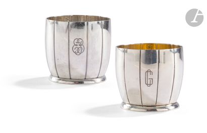 null PARIS CIRCA 1930
Set of two silver goblets, one with a vermeil interior. They...
