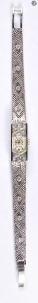null MAUBOUSSIN-CLERC. Lady's watch in 18K (750) white gold, rectangular dial decorated...