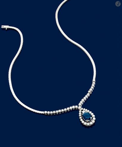 null Necklace in 18K (750) white gold, centered on an oval sapphire surrounded by...