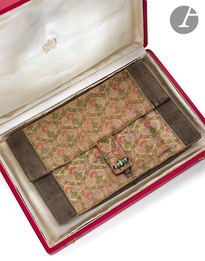 null CARTIER. Brocaded silk clutch bag with polychrome floral decoration bordered...
