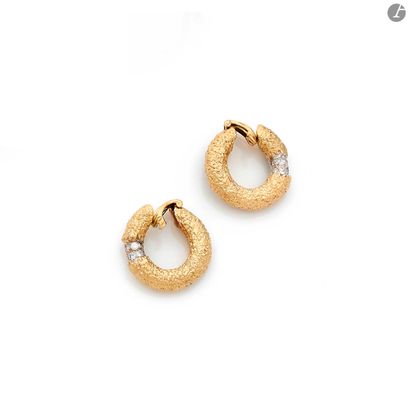 null MR. GÉRARD. Pair of 18K (750) gold granite ear clips, each adorned with round...