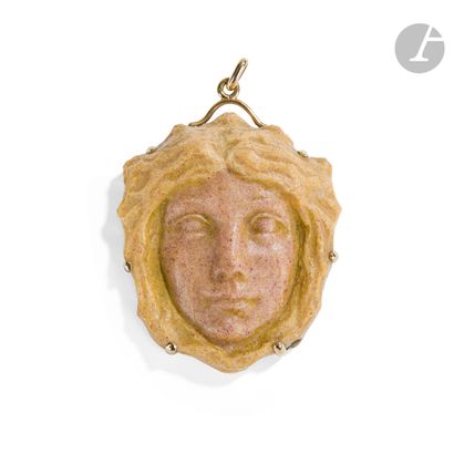 null GEORGES DESPRET (1862-1952)
Symbolist face, circa 1907
Medallion mounted as...