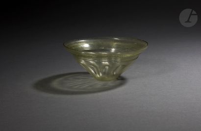 null Conical cup with flat bottom decorated with ten depressions 
Surmounted by an...