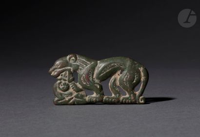 null Plate showing a panther attacking a deer
Bronze. 
Steppe art, Ordos, 4th-2nd...