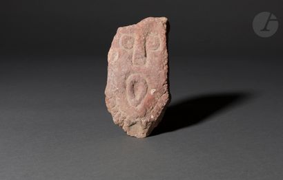 null Statue called menhir representing a face
The face, rectangular, is drawn in...
