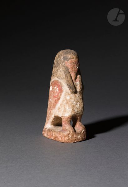 null Statuette representing the bird Bâ standing on its front legs
Stuccoed and polychrome...