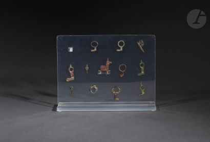 Twelve bronze elements, mainly keys 
Bronze.
Roman...