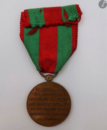 null FRANCE 
MÉDAILLE DES COMBATS DE MONT-DIEU, TANNAY ET STONNE (1940). 
En bronze....