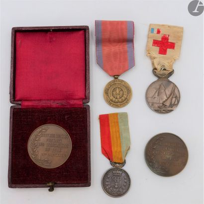 
Four medals: 
- medal of the Society of...