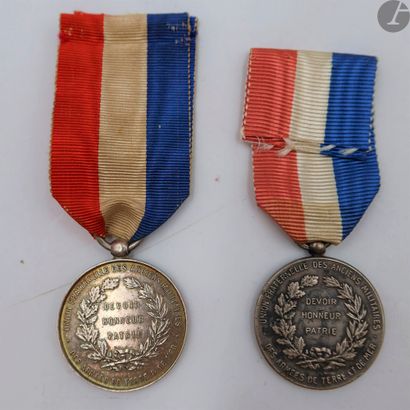 null ANCIENS COMBATTANTS 
Two medals of the fraternal union of the former soldiers...