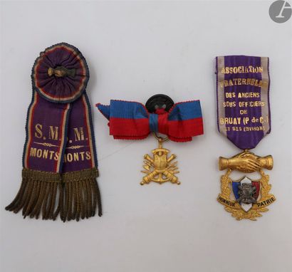 null VETERANS COMBATANTThree
badges: 
- society membership ribbon, possibly Napoleonic...